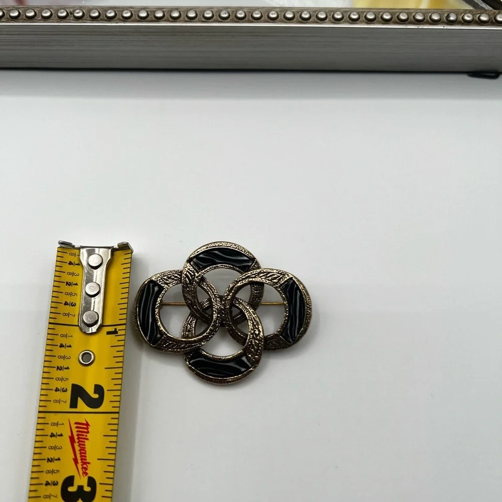 Vintage Celtic Black and Gold Brooch